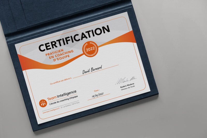 Modern team coaching certificate, elegant design in orange and black, perfect for visual communication.