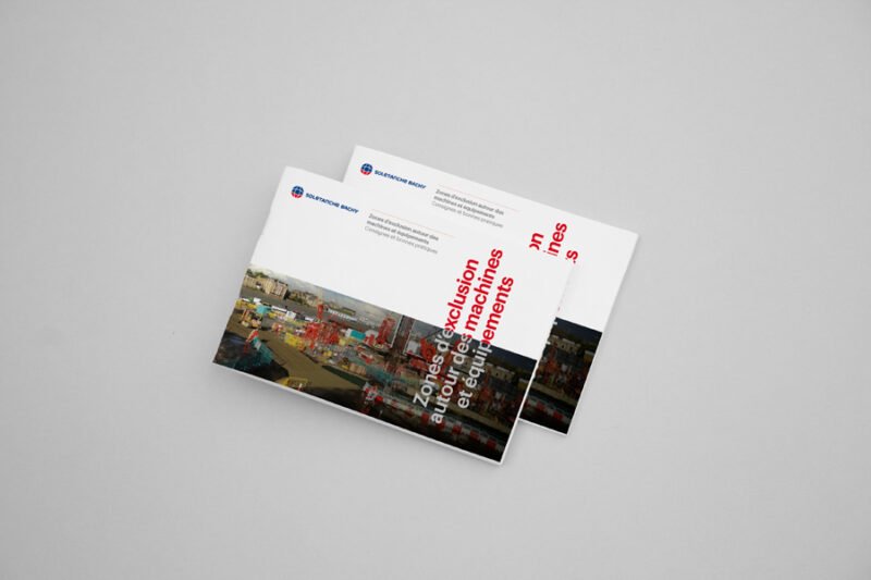 Brochure moderne sur les zones d'exclusion industrielles, design par un graphiste freelance, mise en page créative.